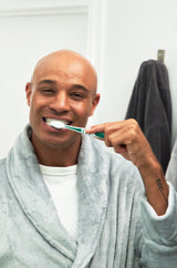 Cleure Toothbrush being used