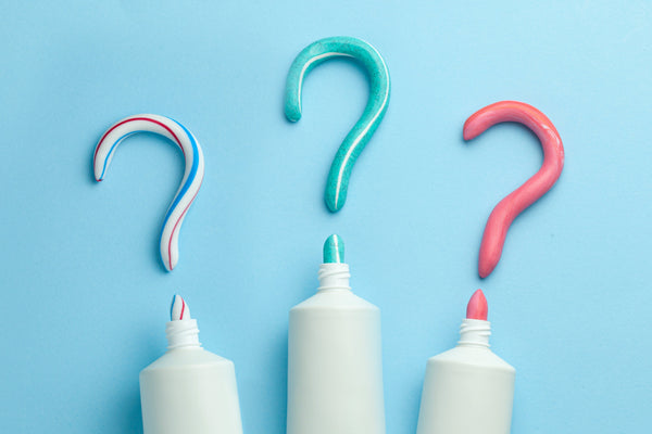 Toothpaste in Question Marks by Adragan